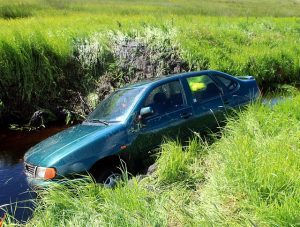 car in ditch